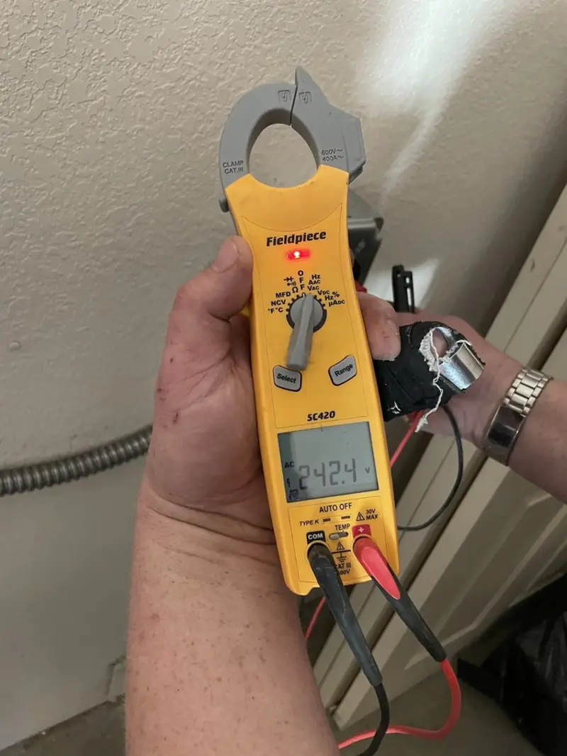 Voltage testing with clamp meter during Generator Installation in Westport
